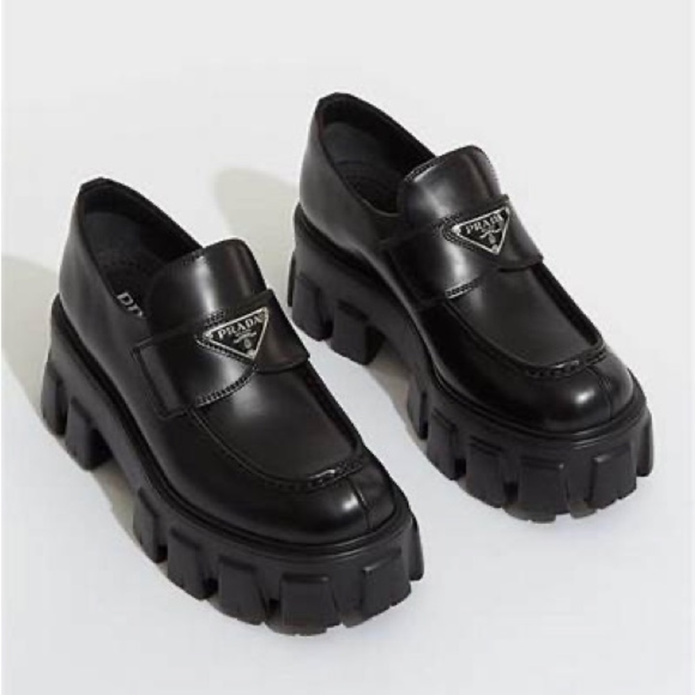 Prada monolith loafers size 7 BNWT perfect condition.Original box and bags black